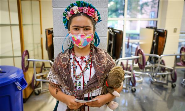Girl dressed as Frida Kahlo